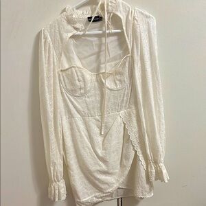 Pretty Little Thing  
small white dress never worn!